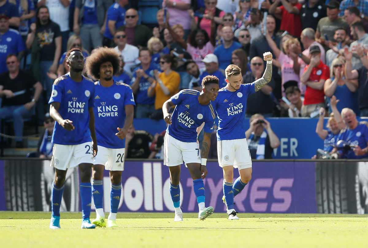 Leicester City`s James Maddison celebrates scoring their second goal with team mates. Photo: Reuters