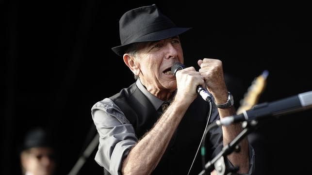 This file photo taken on 20 July 2008 shows Canadian singer Leonard Cohen perform during the international Festival of Beincassim. Leonard Cohen, the storied musician and poet hailed as one of the most visionary artists of his generation, has died at age 82, his publicist announced on10 November 2016. Photo: AFP