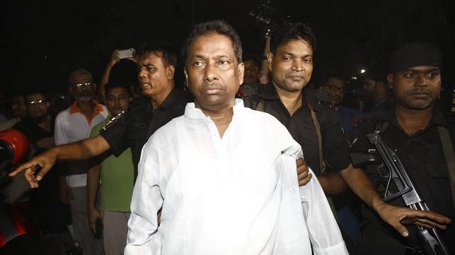 RAB men detain Kalabagan Krira Chakra president Safiqul Alam Firoz from the club’s office on 20 September. Prothom Alo File Photo
