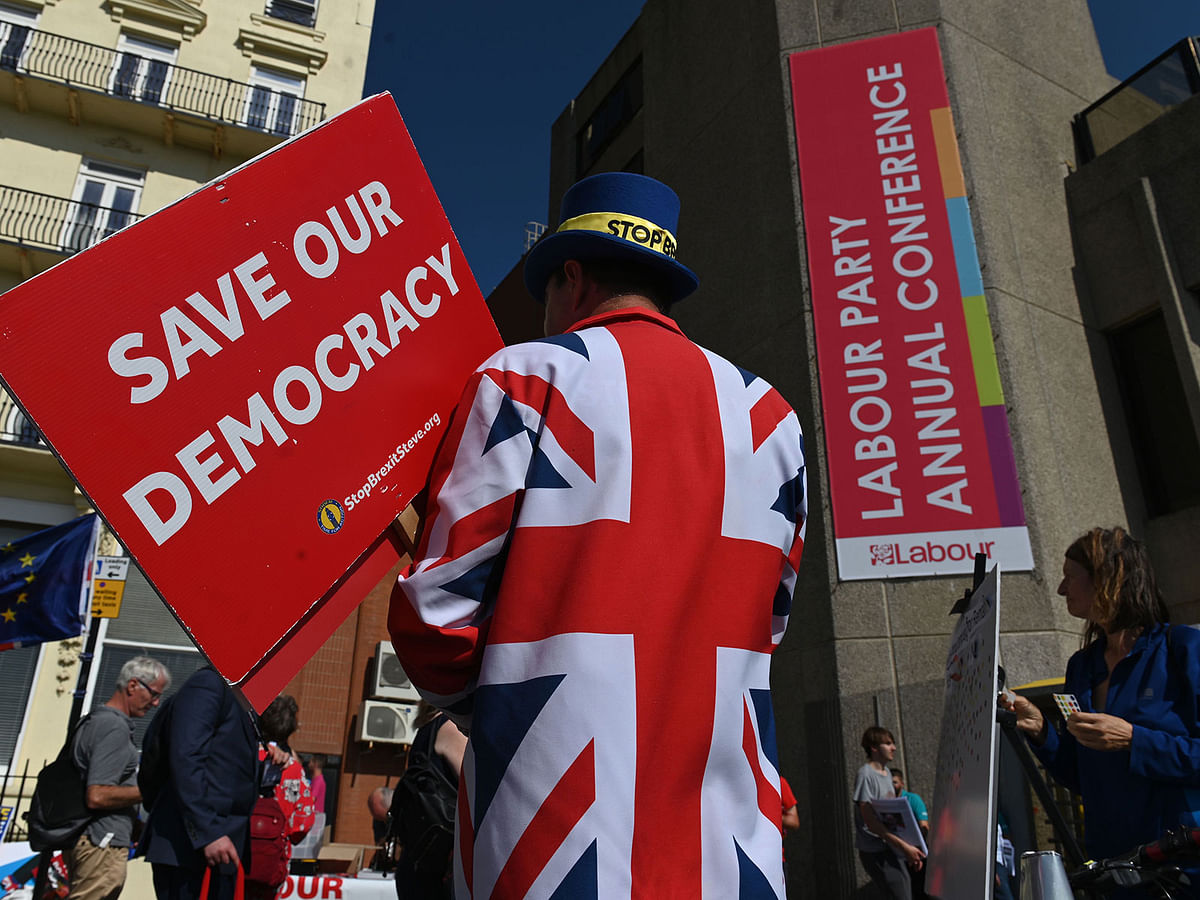 Anti-Brexit campaigners protest outside the Labour party conference in Brighton, on the south coast of England on 21 September 2019. Photo: AFP