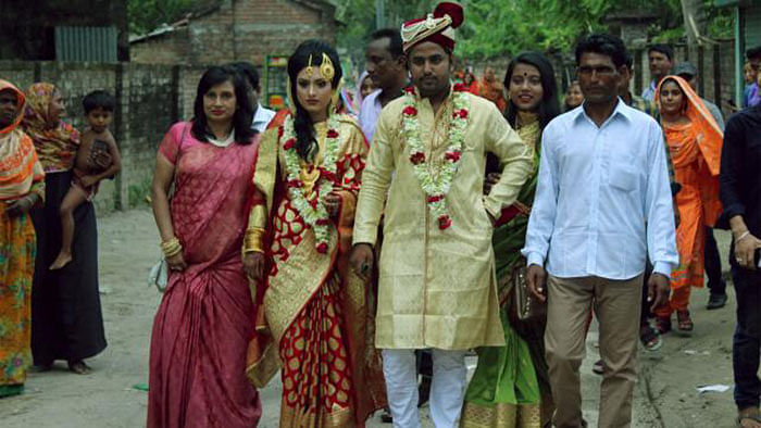 A 19-year-old bride, Khadiza Akhter, has challenged Bangladesh Muslim wedding tradition by taking her groom, Toriqul Islam, to her home after their marriage recently. Photo: Shah Alam