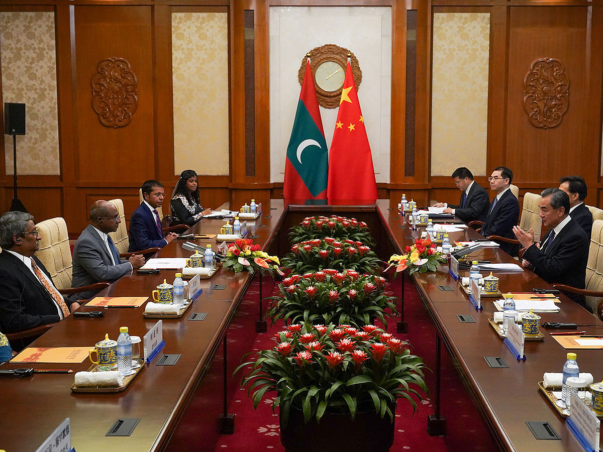 Maldives foreign minister Abdulla Shahid speaks to Chinese foreign minister Wang Yi during a meeting at Diaoyutai State Guesthouse, Beijing, China on 20 September 2019. Photo: Reuters