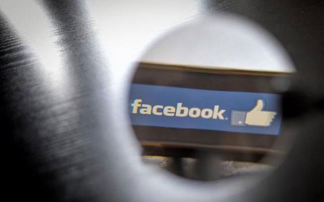 In this file photo taken on 15 January 2019, the logo of social network Facebook is displayed on a smartphone in Nantes, western France. Photo: AFP