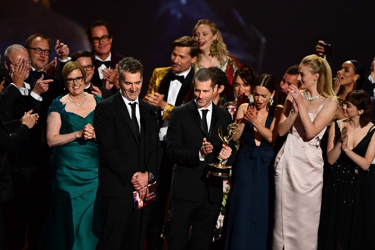 DB Weiss (C) and cast and crew of `Game of Thrones` accept the Outstanding Drama Series award onstage during the 71st Emmy Awards at the Microsoft Theatre in Los Angeles on 22 September, 2019. Photo: AFP