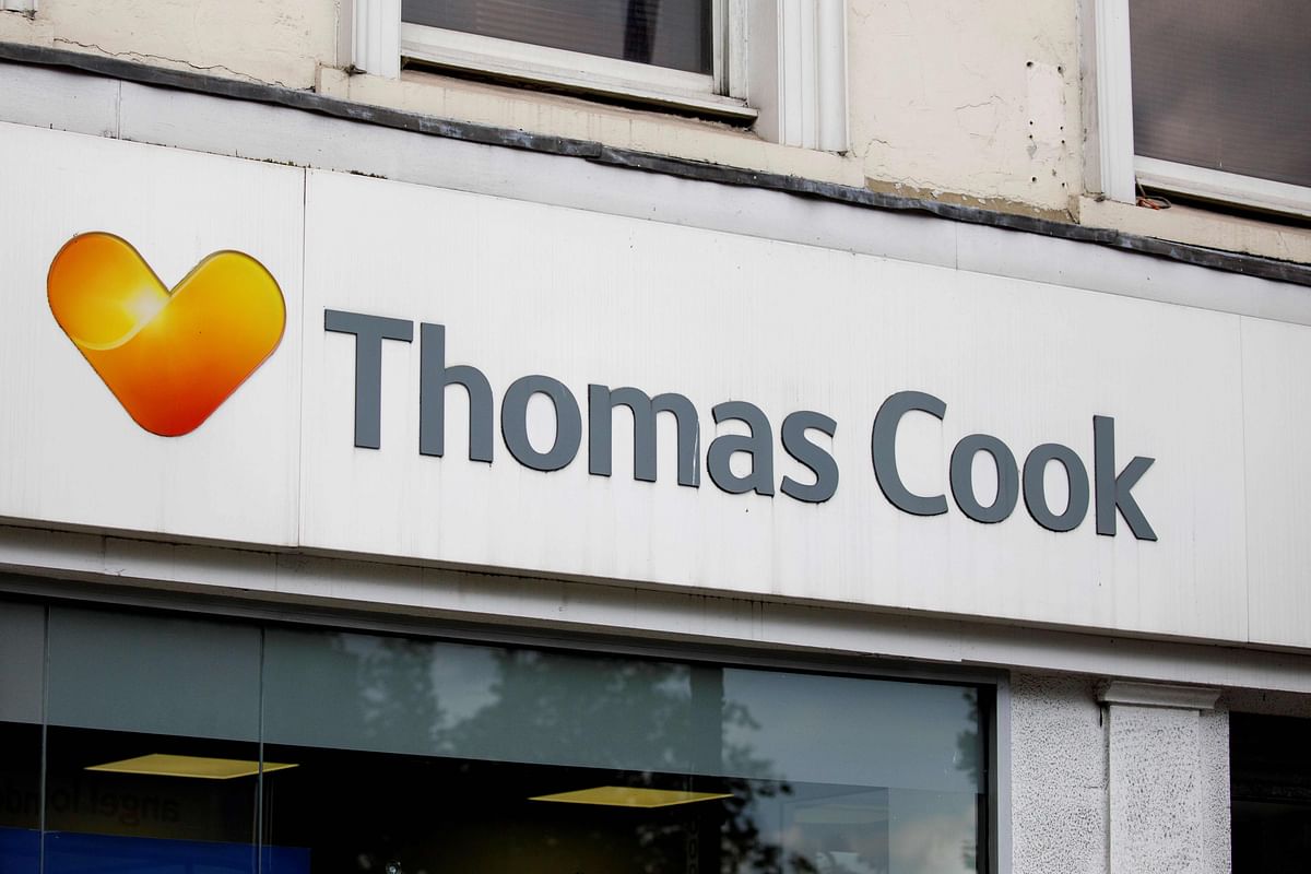 In this file photo taken on 12 July 2019, a sign is pictured at a branch of a Thomas Cook travel agent`s shop in London. Thomas Cook declared bankruptcy on 23 September 2019 after failing to reach a last-ditch rescue deal. Photo: AFP