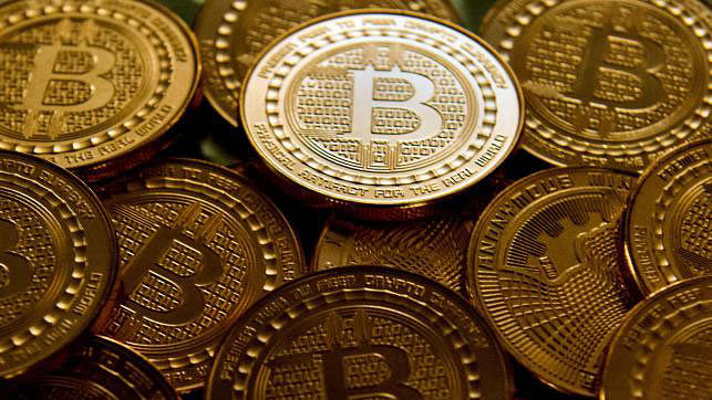 Bitcoin medals. Bitcoin burst out of the shadows in 2017, seducing Wall Street and individual investors alike even though many still struggle to understand precisely what it is. AFP file photo