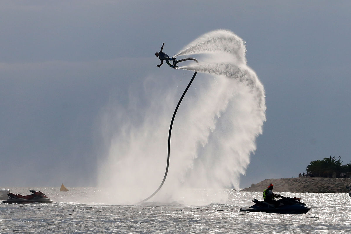 A man performs a demonstration of flyboard on the sidelines of the French jetski cup in Ajaccio on 21 September 2019 on the French Mediterranean island of Corsica. Photo: AFP