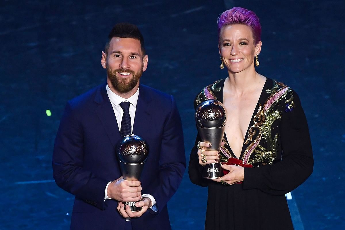 Best FIFA Men`s Player of 2019, Argentina and Barcelona forward Lionel Messi (L) and Best FIFA Women`s Player of 2019, US and Reign FC midfielder Megan Rapinoe pose at the end of The Best FIFA Football Awards ceremony, on 23 September, 2019 in Milan. Photo: AFP