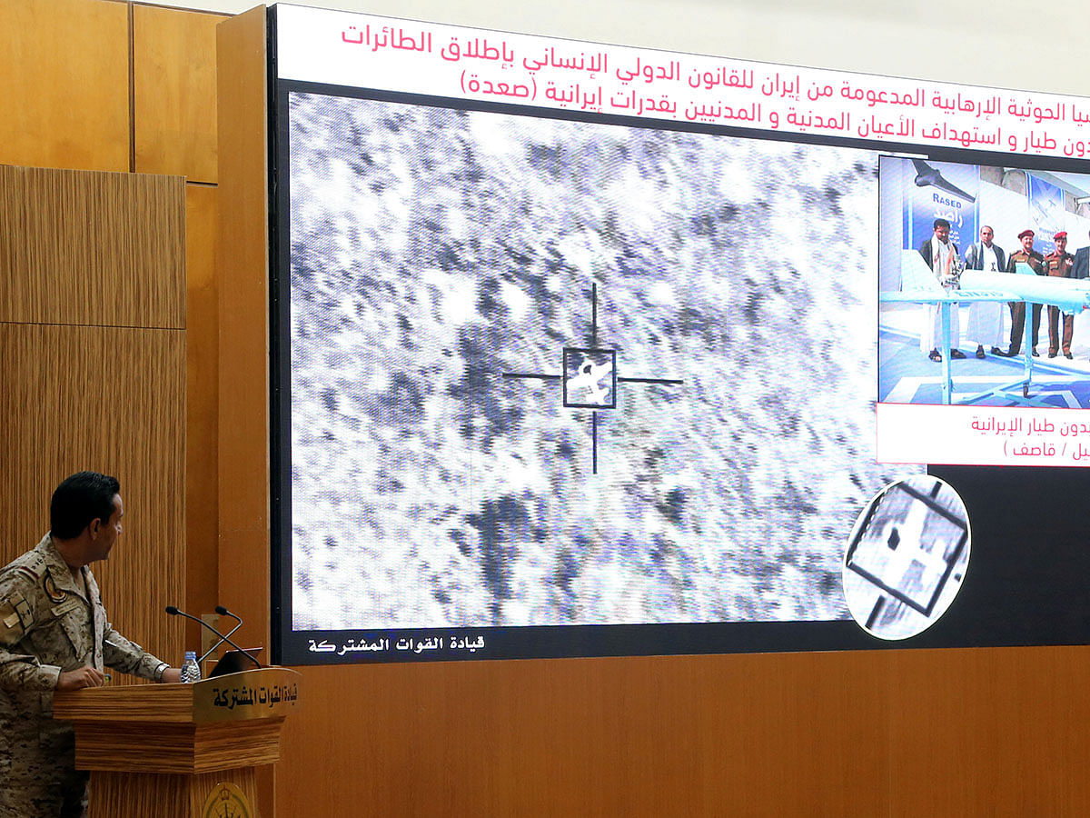 Official spokesperson for the Saudi-led coalition fighting in Yemen, Colonel Turki Al-Malik, displays on a screen a satellite image shows an drone strike during a news conference, in Riyadh. Photo: Reuters
