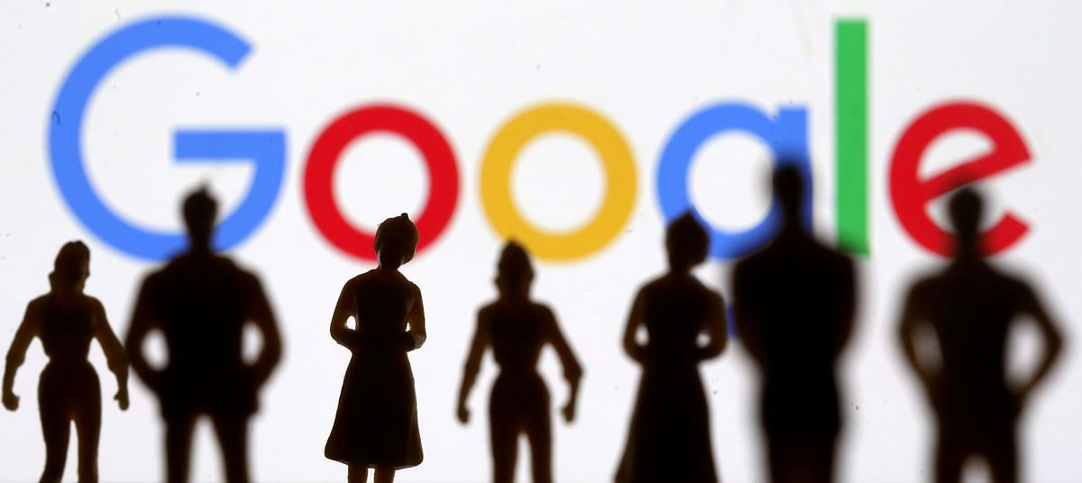 Small toy figures are seen in front of Google logo in this illustration picture. Photo: Reuters