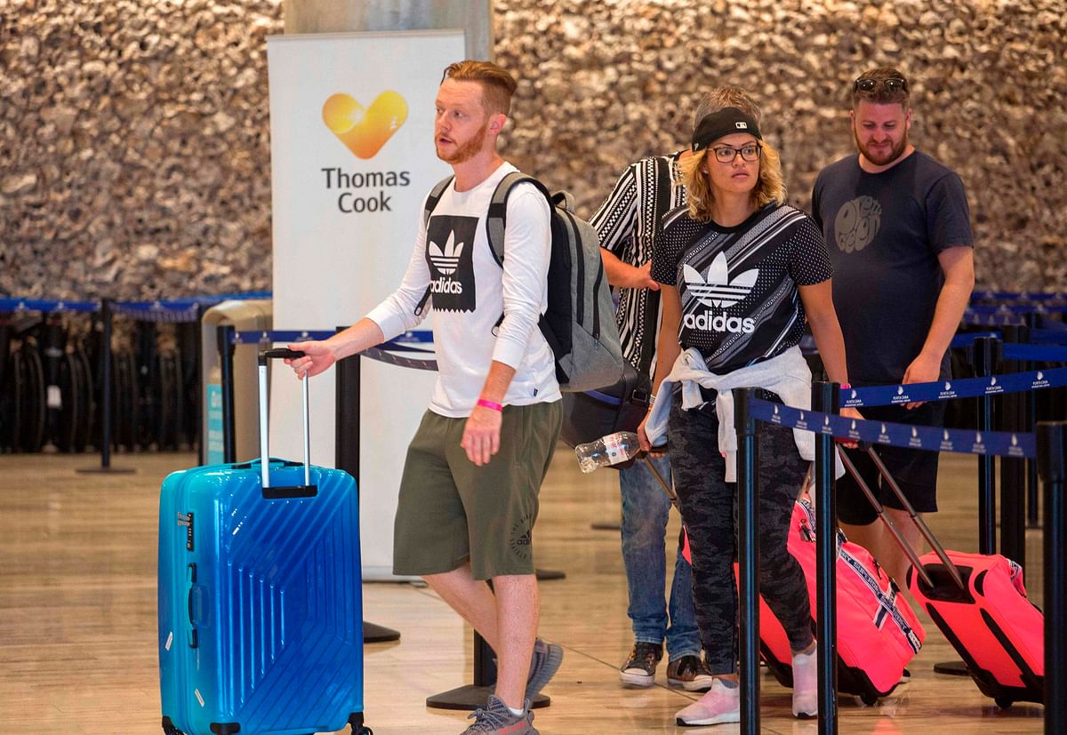 Passengers left stranded after the collapse of British travel firm Thomas Cook remain at Punta Cana`s international airport, in the Dominican Republic, on 23 September 2019. Photo: AFP