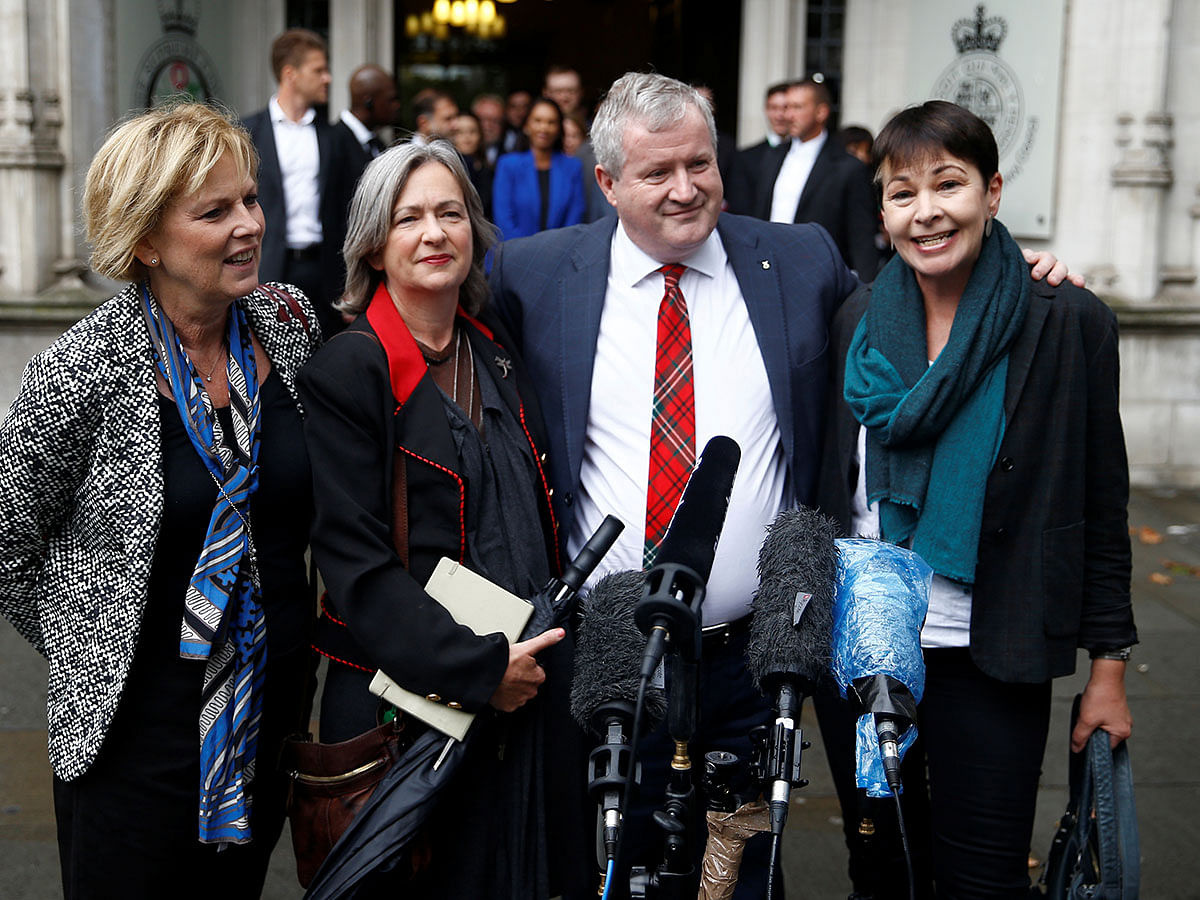 MPs Anna Soubry, Liz Saville Roberts and Caroline Lucas, together with Ian Blackford, leader of the Scottish National Party (SNP), react after the Supreme Court of the United Kingdom hearing on British prime minister Boris Johnson`s decision to prorogue parliament ahead of Brexit, in London, Britain on 24 September 2019. Photo: Reuters