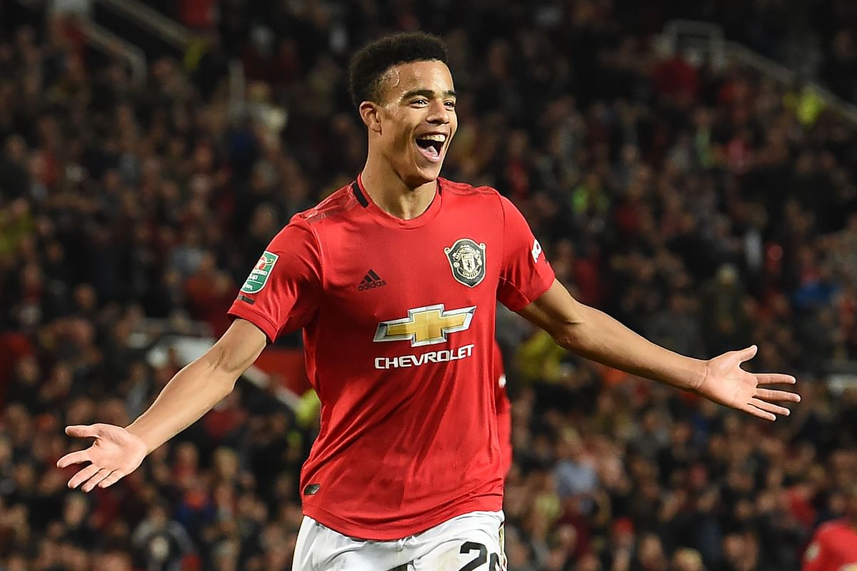 Manchester United`s striker Mason Greenwood celebrates after scoring the opening goal of the English League Cup third round football match between Manchester United and Rochdale at Old Trafford in Manchester, north-west England on Wednesday. Photo: AFP