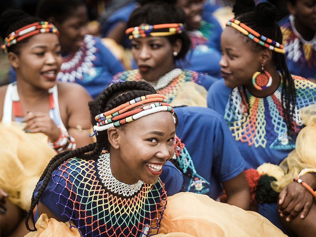 Women dressed in Zulu traditional regalia joins thousands of people to commemorate King Shaka`s Day Celebration near the grave of the great Zulu King Shaka at Kwadukuza, some 98 kilometres north of Durban, on 24 September 2019. Photo: AFP
