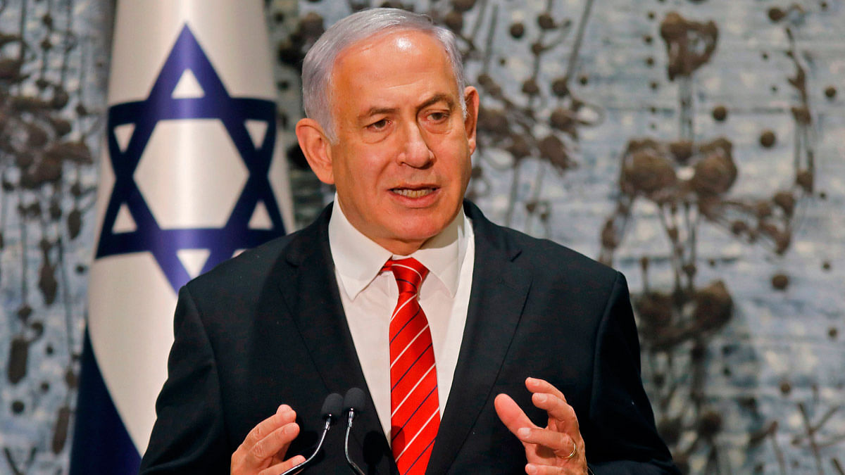 Israeli prime minister Benjamin Netanyahu speaks after being tasked by President Reuven Rivlin (not in frame) with forming a new government, during a press conference in Jerusalem on 25 September. Photo: AFP