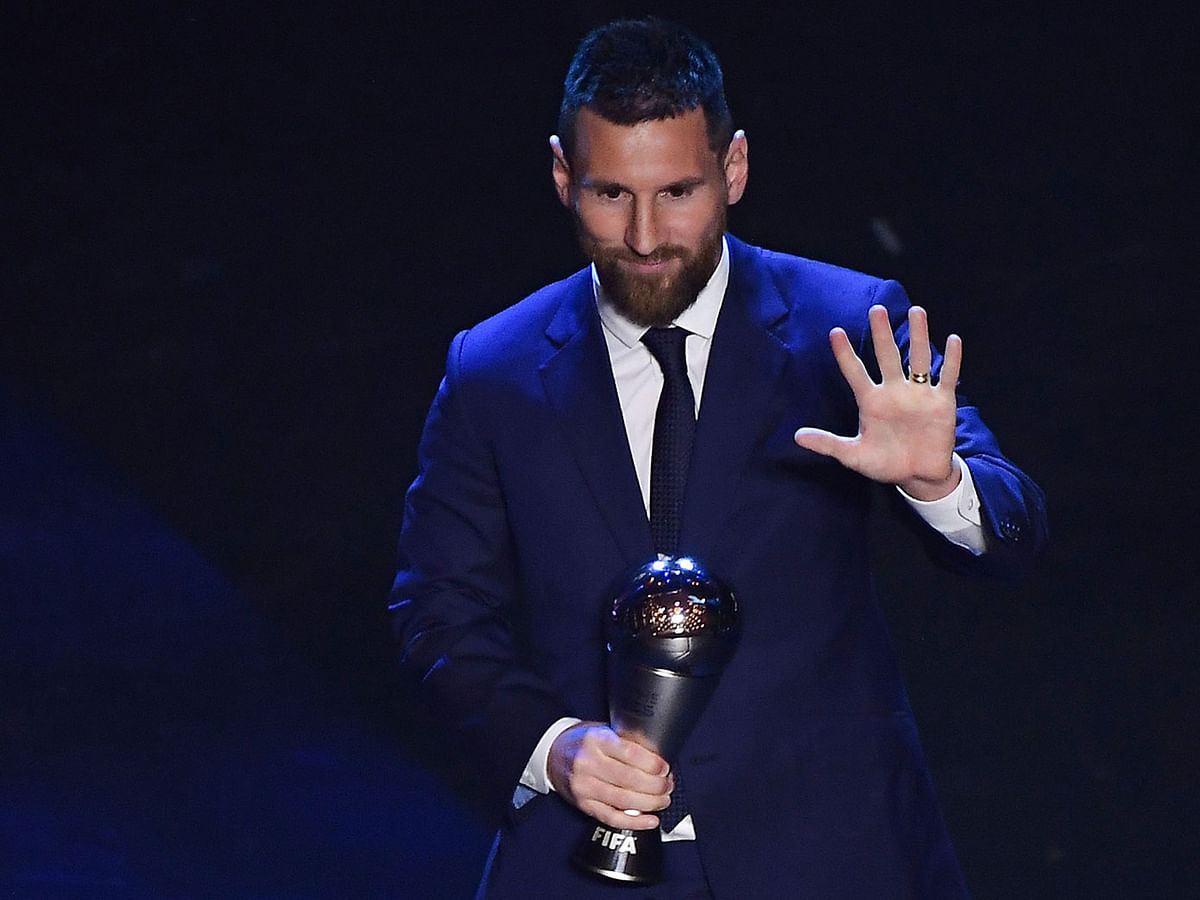 Argentina and Barcelona forward Lionel Messi reacts after winning the trophy for the Best FIFA Men`s Player of 2019 Award, during The Best FIFA Football Awards ceremony, on 23 September 2019 in Milan. Photo: AFP