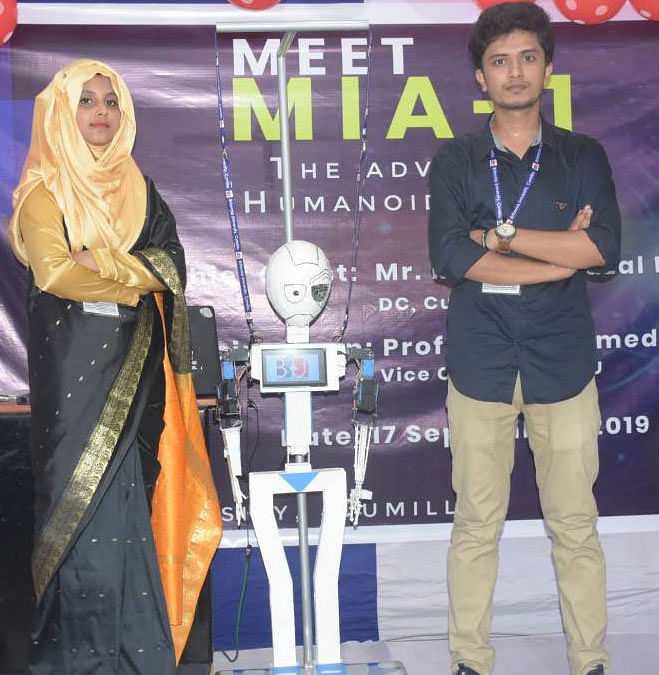 Robot makers Mahmuda Arefin (L) and Ashraful Rahman Minhaj. Photo: UNB