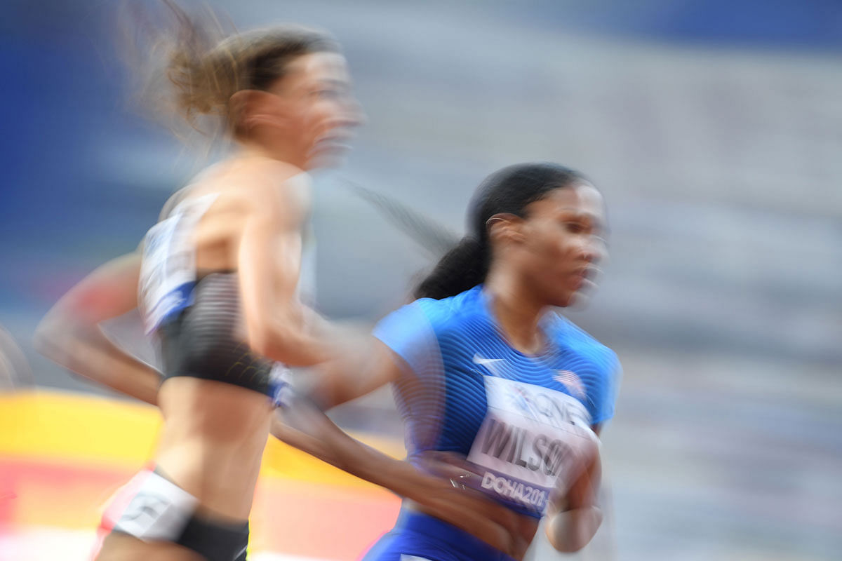 USA`s Ajee Wilson (R) competes in the Women`s 800m heats at the 2019 IAAF World Athletics Championships at the Khalifa International stadium in Doha on 27 September, 2019. Photo: AFP