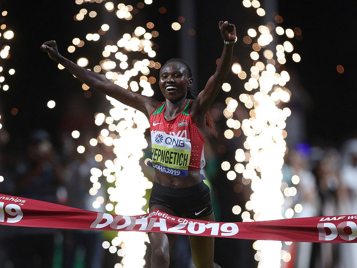 Kenya`s Ruth Chepngetich crosses the line to win the race in Women`s Marathon during the World Athletics Championships in Doha, Qatar on 28 2019. Photo: Reuters