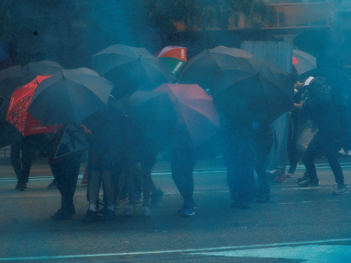 5Anti-government protesters cover themselves with umbrellas during a demonstration in Admiralty district, Hong Kong, China, 29 September 2019. Photo: Reuters