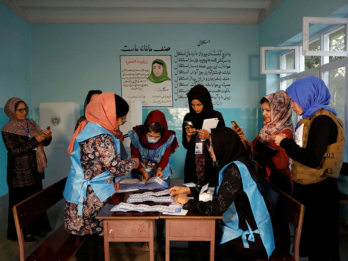 Afghan election commission workers count ballot papers of the presidential election in Kabul, Afghanistan on 28 September 2019. Photo: Reuters