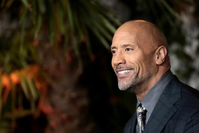 Actor Dwayne Johnson poses for photographers as he arrives for the UK premiere of `Jumanji: Welcome to the Jungle` at central London in Britain on 7 December 2017. Photo: Reuters