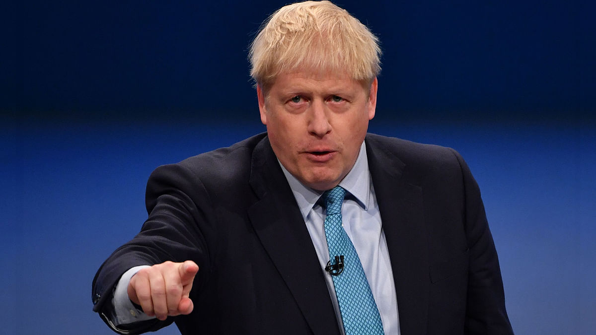 Britain`s Prime Minister Boris Johnson delivers his keynote speech to delegates on the final day of the annual Conservative Party conference at the Manchester Central convention complex, in Manchester, north-west England on 2 October 2019. Photo: AFP