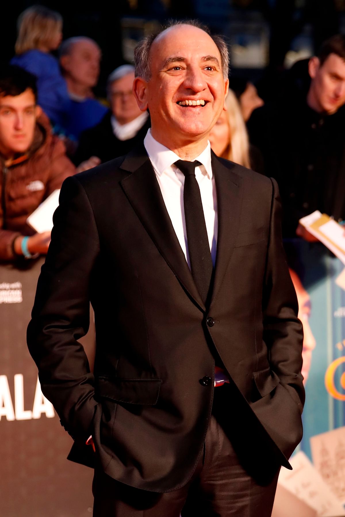 British film director Armando Iannucci poses upon arrival for the European Premiere of the film `The Personal History of David Copperfield` during the opening night gala event for the BFI London Film Festival in London on 2 October 2019. Photo: AFP