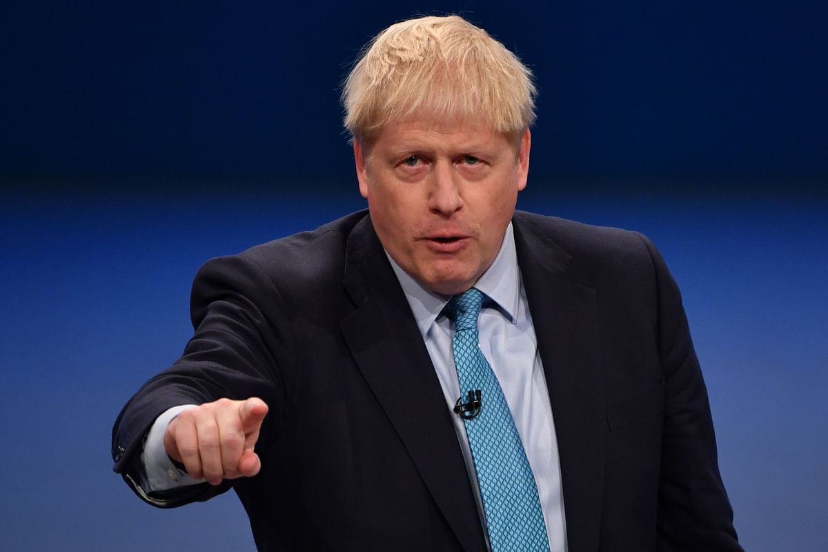 Britain`s prime minister Boris Johnson delivers his keynote speech to delegates on the final day of the annual Conservative Party conference at the Manchester Central convention complex, in Manchester, north-west England on 2 October. Photo: AFP