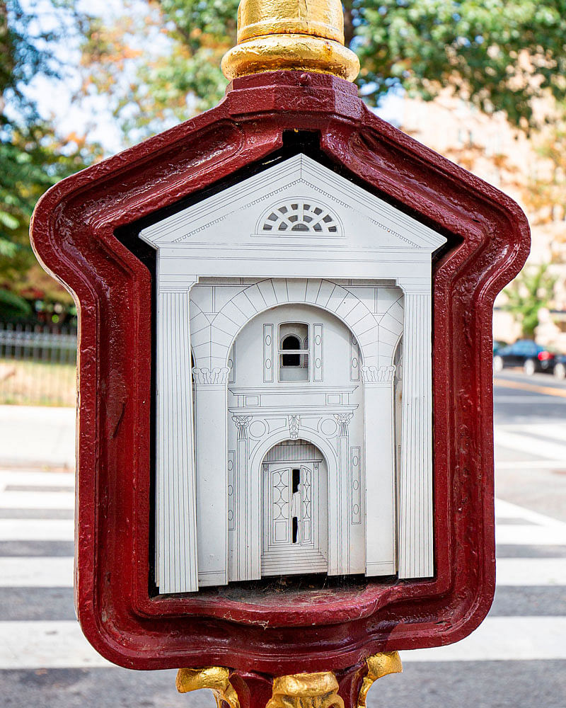 An old police and fire call box is decorated with art by artist Supon Phornirunlit as part of the Sheridan-Kalorama Call Box Restoration Project in Washington, DC, on 16 September 2019. Photo: AFP