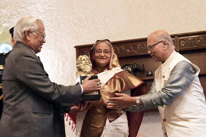 Prime minister Sheikh Hasina on Saturday receives `Tagore Peace Award 2018` in New Delhi in recognition of her contribution to maintaining regional peace and prosperity. Photo: BSS