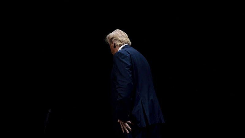 In this file photo taken on 3 October 2019 US President Donald Trump leaves after signing an executive order regarding Medicare at Sharon L. Morse Performing Arts Center in The Villages, Florida. Photo: AFP