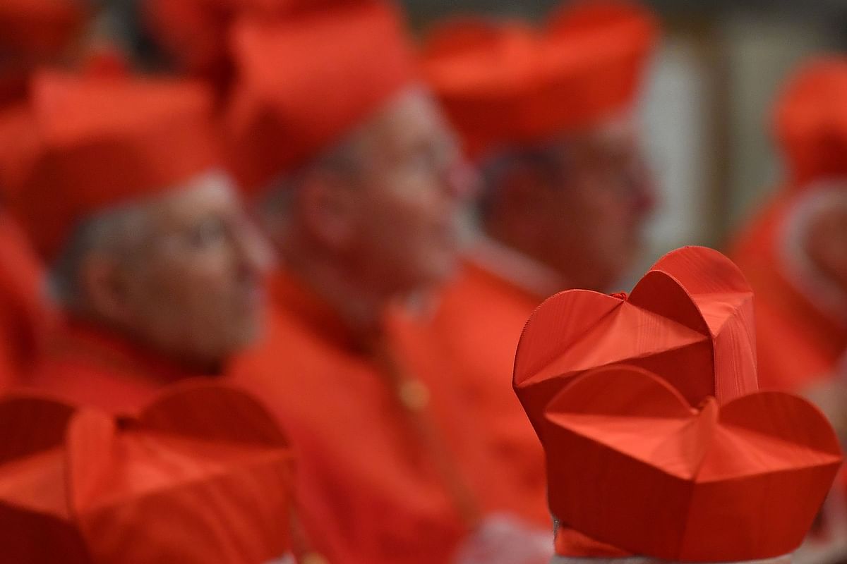 Cardinals wearing their berretta square cap (Biretta) attend a Pope`s Ordinary Public Consistory for the creation of new cardinals, for the imposition of the biretta, the consignment of the ring and the assignment of the Title or Diaconate, on 5 October 2019 at St. Peter`s Basilica in the Vatican. Photo: AFP
