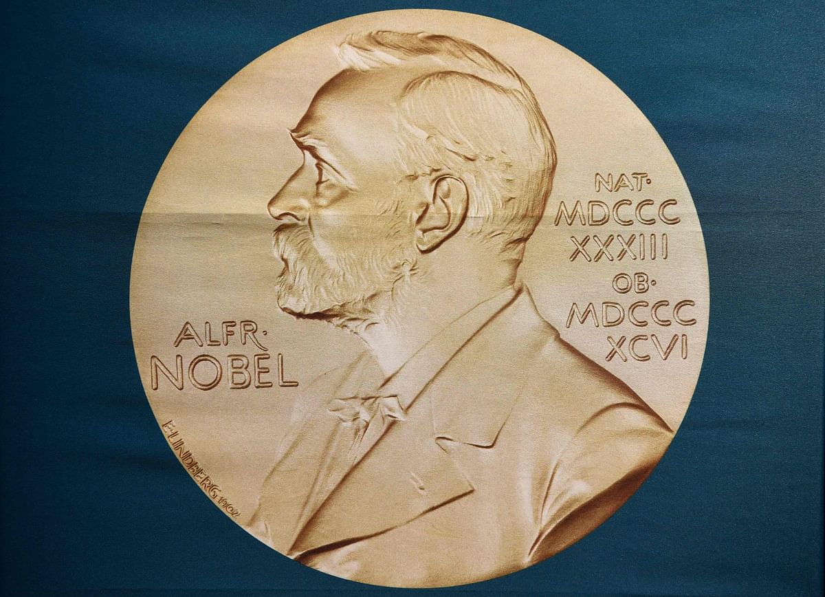 In this file photo taken on 1 October 2018 A portrait of Swedish inventor and scholar Alfred Nobel can be seen on a banner on display at the Nobel Forum in Stockholm, Sweden, prior to a press conference to announce the winner of the 2018 Nobel Prize in Physiology or Medicine at the Karolinska Institute in Stockholm, Sweden. Photo: AFP