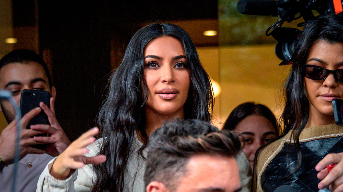 US reality television star Kim Kardashian (L) and her sister Kourtney Kardashian leave a hotel in Yerevan on 7 October 2019. Photo: AFP