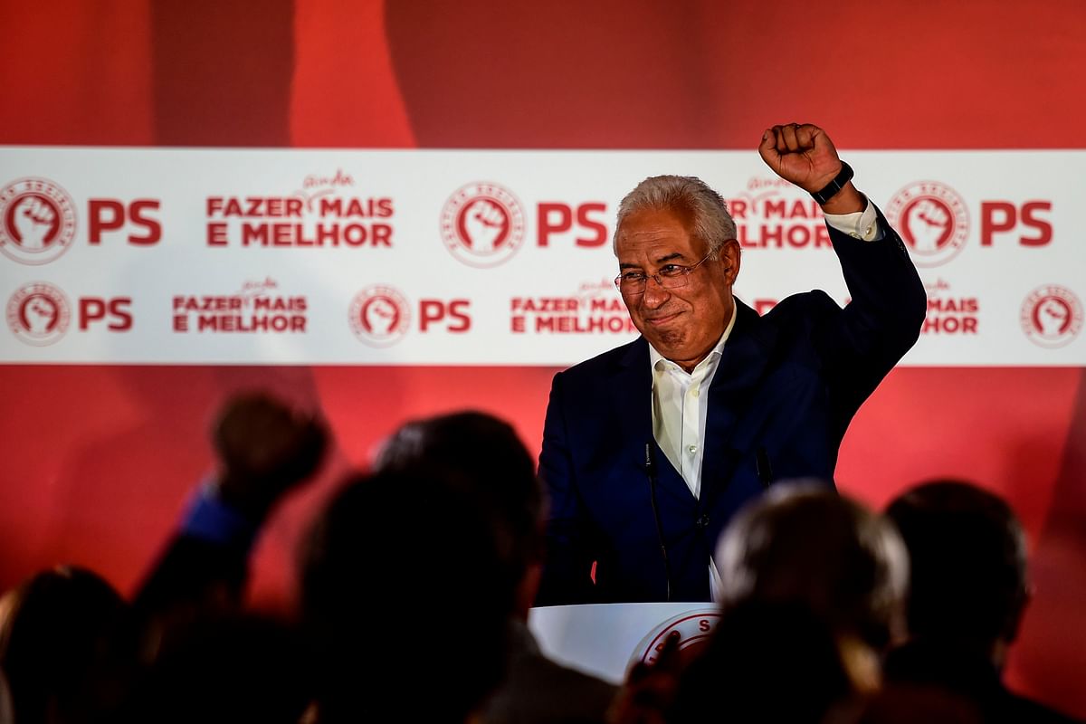 Socialist party candidate and Portuguese Prime Minister Antonio Costa raises his fist as he addresses the nation after winning the Portugal`s General Election in Lisbon on 6 October, 2019. Photo: AFP