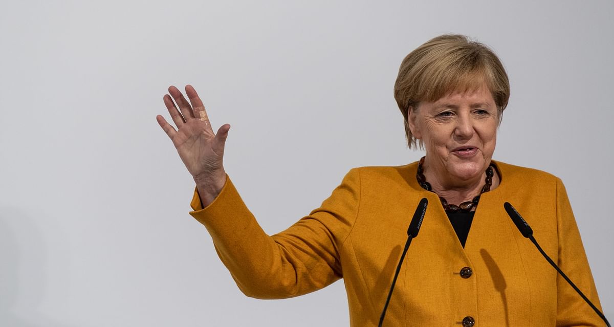German Chancellor Angela Merkel addresses the audience as she visits the Herrenknecht company producing tunnel boring machines and developing project-specific tunnelling technologies plant in Schwanau, southern Germany, on 7 October 2019. Photo: AFP