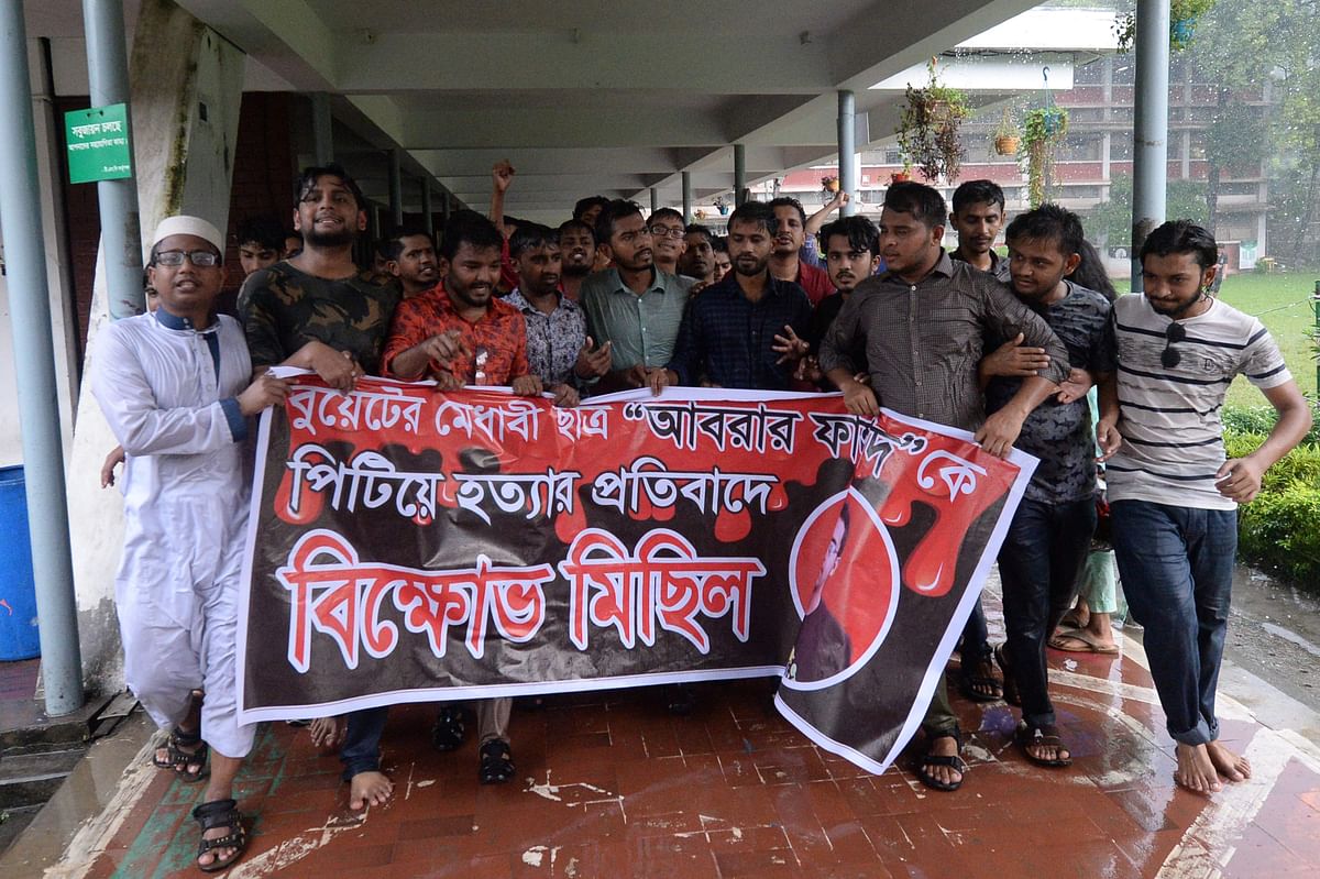Bangladeshi students of Dhaka University take part in a protest in Dhaka on 7 October 2019. Hundreds of students staged protests in Bangladesh universities after a pupil was allegedly beaten to death by activists of the ruling party hours after he criticised prime minister Sheikh Hasina`s water sharing deal with India. Photo: AFP