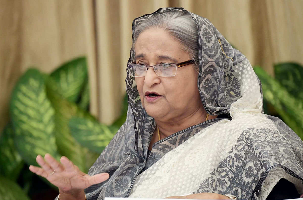 Prime minister Sheikh Hasina addressing a press conference about her recent official visits to the USA and India at Ganabhaban on Wednesday. Photo: PID