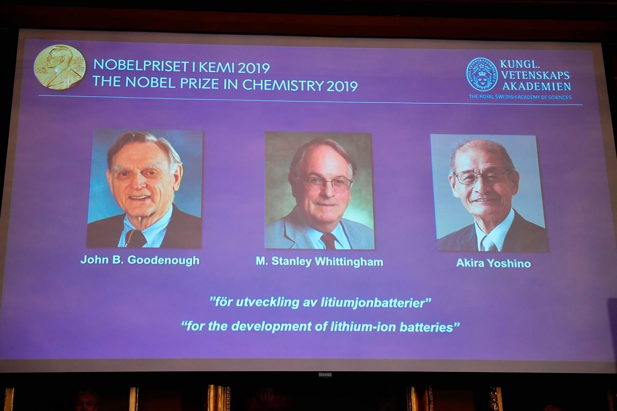 A screen displays the portraits of the laureates of the 2019 Nobel Prize in Chemistry (L-R) John Goodenough of US, Britain`s Stanley Whittingham and Japan`s Akira Yoshino during a press conference at the Royal Swedish Academy of Sciences in Stockholm, Sweden, on 9 October 2019. Photo: AFP