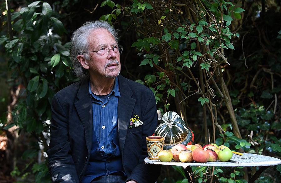 Austrian writer Peter Handke poses in Chaville, in the Paris surburbs, on 10 October 2019 after he was awarded with the 2019 Nobel Literature Prize. Photo: AFP