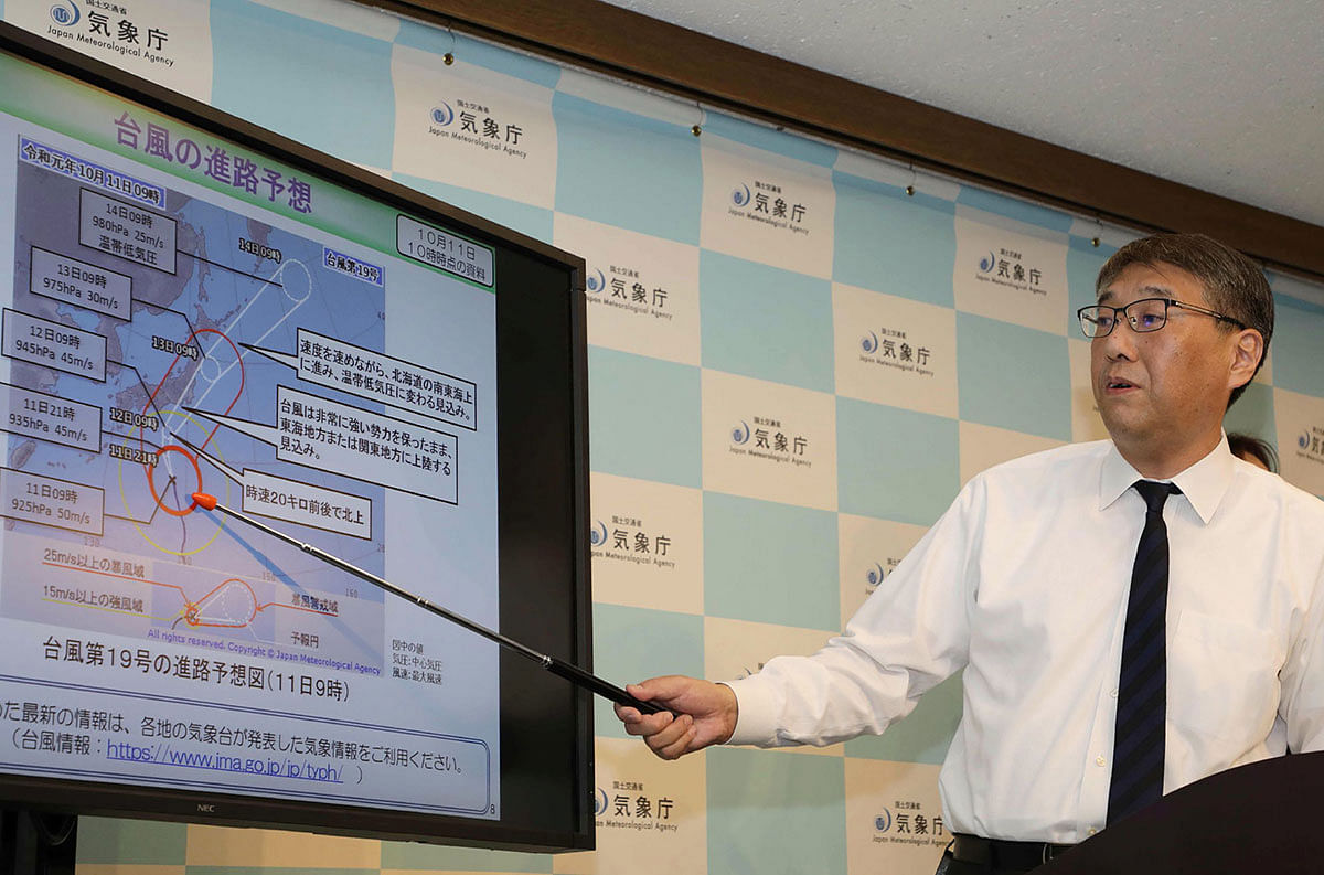 Japan Meteorological Agency forecast division director Yasushi Kajihara holds a press conference on Typhoon Hagibis, at the agency in Tokyo on 11 October 2019. Photo: AFP