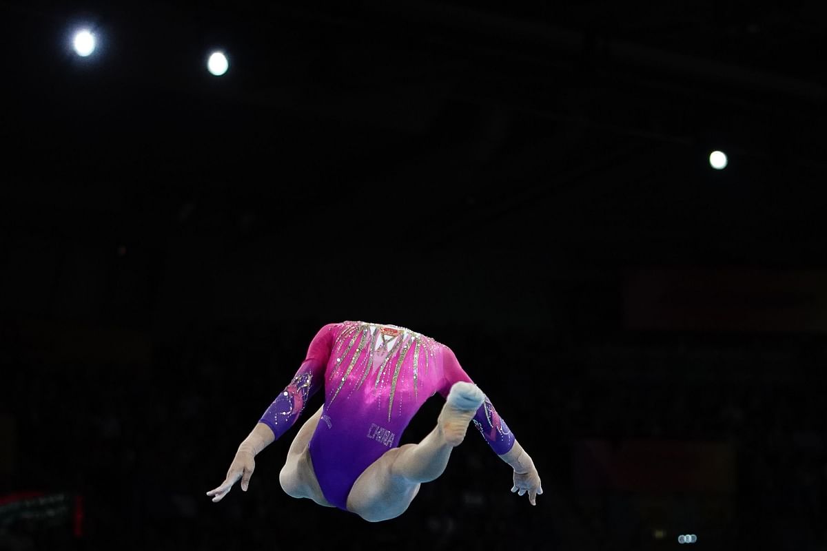China`s Tang Xijing performs on the floor during the women`s all-around final at the FIG Artistic Gymnastics World Championships at the Hanns-Martin-Schleyer-Halle in Stuttgart, southern Germany, on 10 October 2019. Photo: AFP