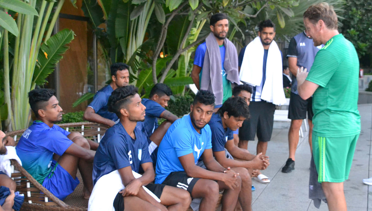 Bangladesh football team coach Jamie Day speaks as the players listen to him. Photo: UNB