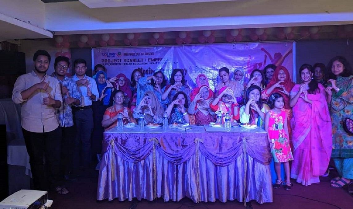 Participants take part in a photo session at the closing ceremony of Project Scarlet: Emerging, jointly organised by the Bangladesh edition of International Federation of Medical Students Association (IFMSA BD) and the Inner Wheel District 345 (IWD 345) in Mahakhali, Dhaka. Photo: UNB