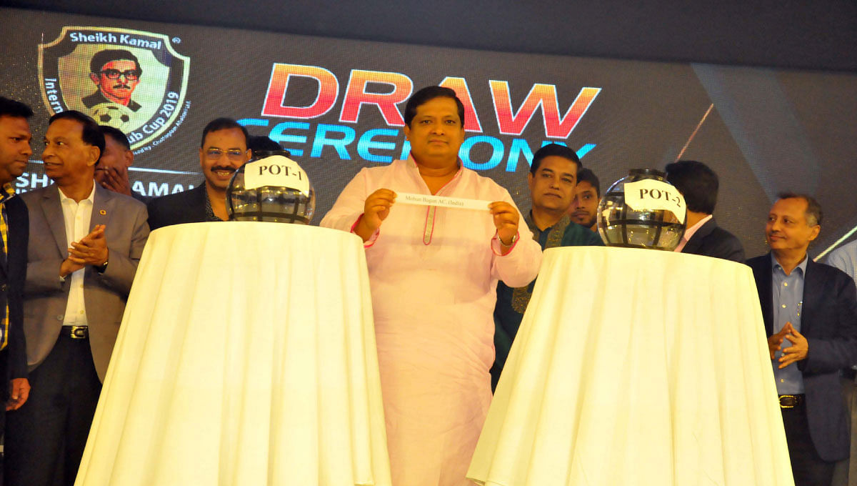 Sheikh Kamal Cup Caption: State Minister for Youth and Sports Zahid Hasan Russell MP holds a team’s name during a draw ceremony of Sheikh Kamal International Club Cup Football Tournament at Le Meridien Hotel here on Friday. Photo: UNB
