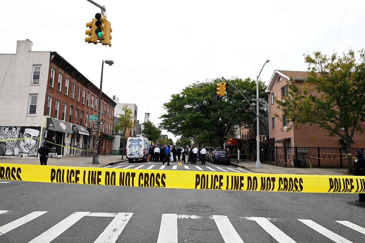 Police tape secures a crime scene outside a club after a shooting in Brooklyn on 12 October, 2019. Photo: AFP