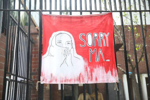 A poster hung on BUET campus seeks apology to Abrar`s mother, saying, `Sorry Ma.`