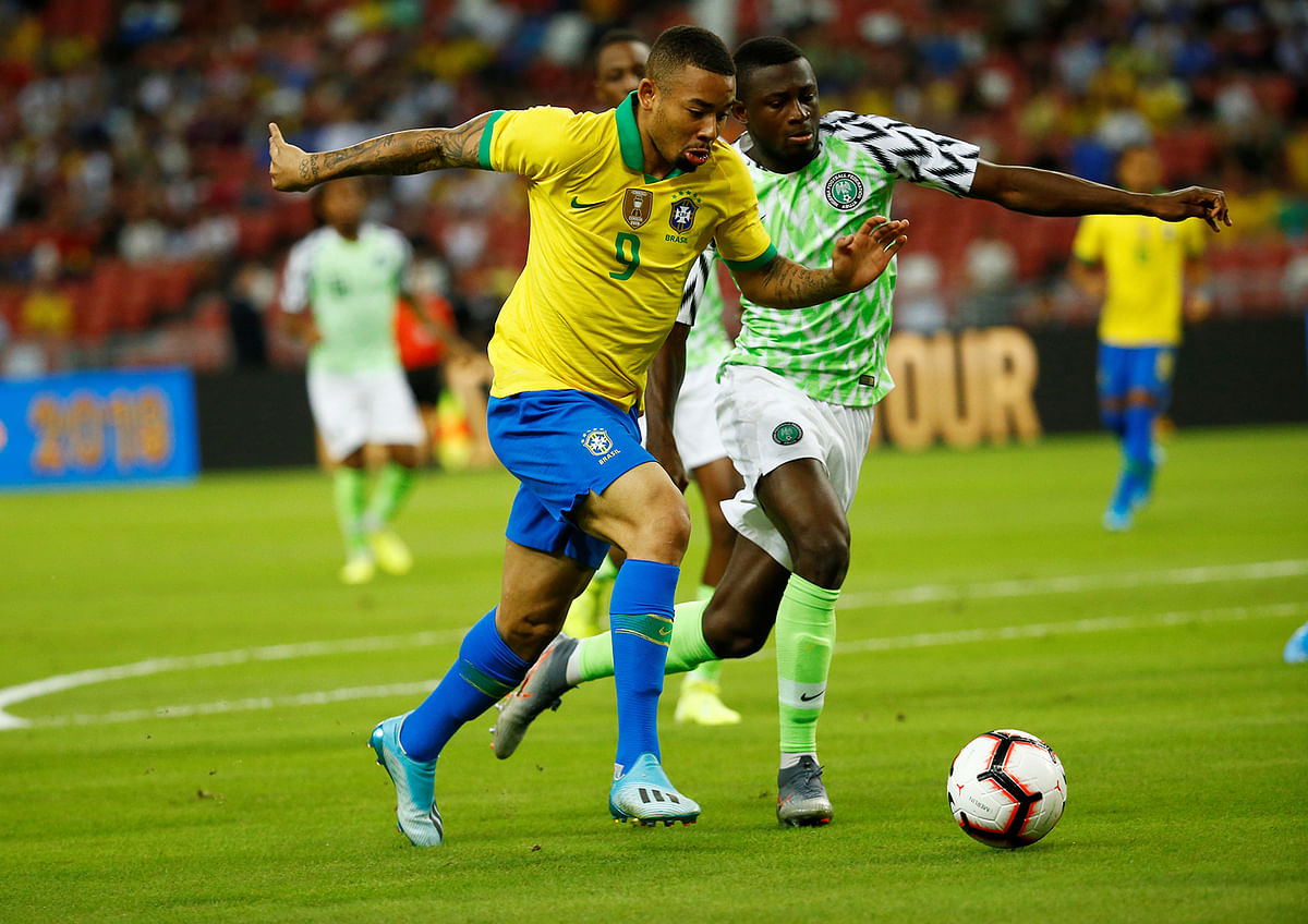 Brazil`s Gabriel Jesus in action with Nigeria`s Jamilu Collins. Photo: Reuters