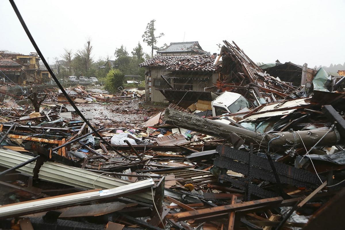 This general view shows damaged homes caused by strong wind brought by Typhoon Hagibis in Ichihara, Chiba prefecture on 12 October 2019. Photo: AFP